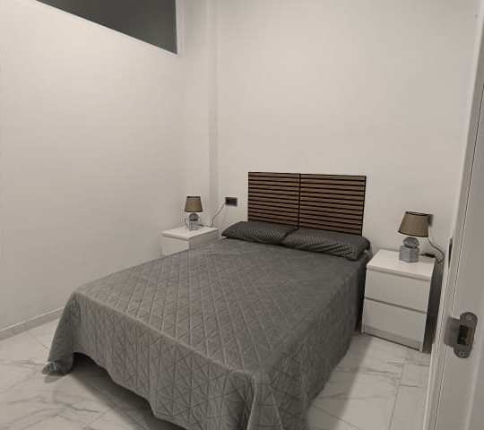 Doble con patio privado - vista cama principal